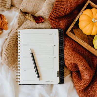 fall setting with journal and glasses